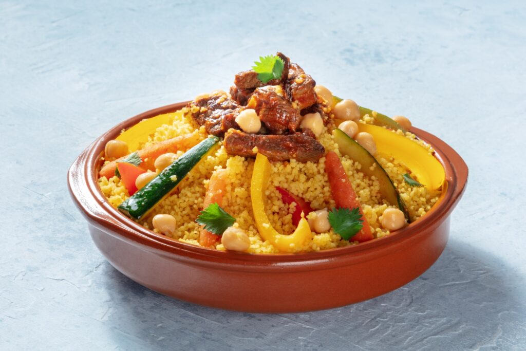 Meat and vegetable couscous in a bowl, typical food from Morocco